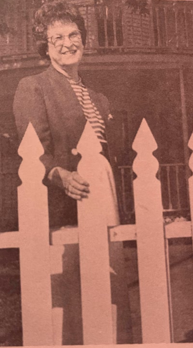 Ellen Shaw standing by some of the 784 pickets cut by May Shaw